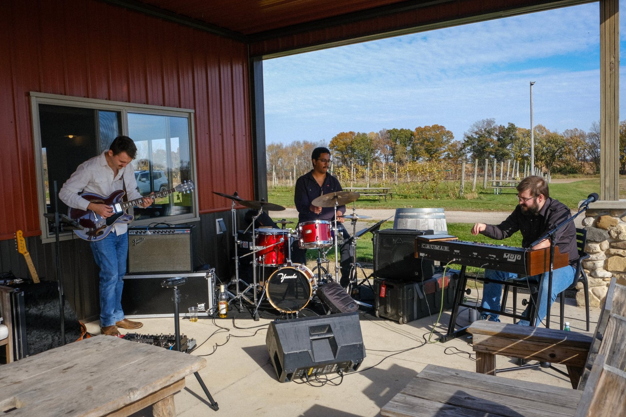 Papa Nubs Organ Trio performing on a covered winery patio