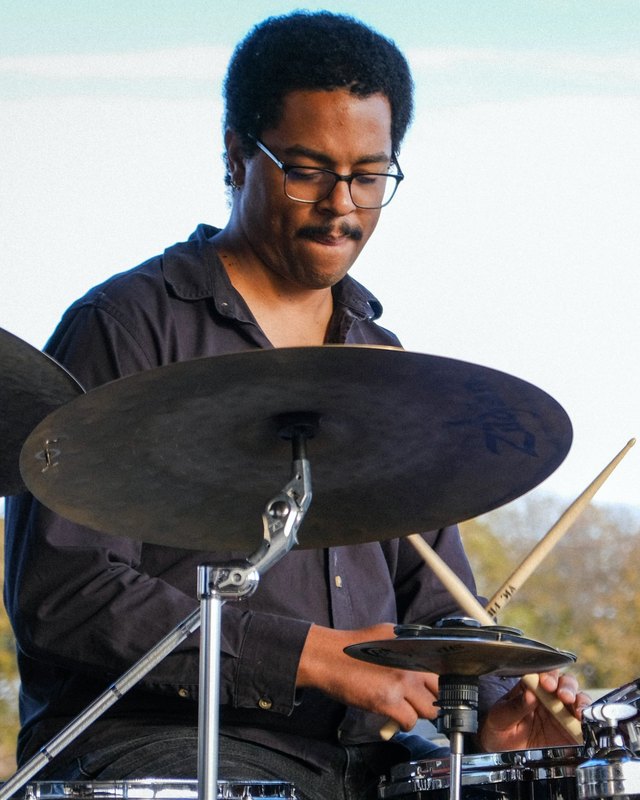 Ryan Thomas playing drums